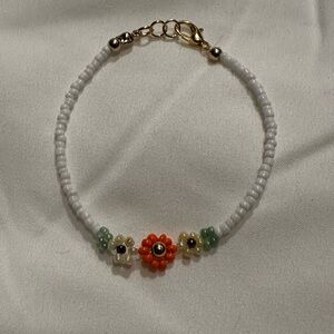 Handmade Beaded Floral Bracelet with Gold Accents